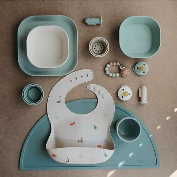 Mushie Silicone Baby Bib | Dinosaurs