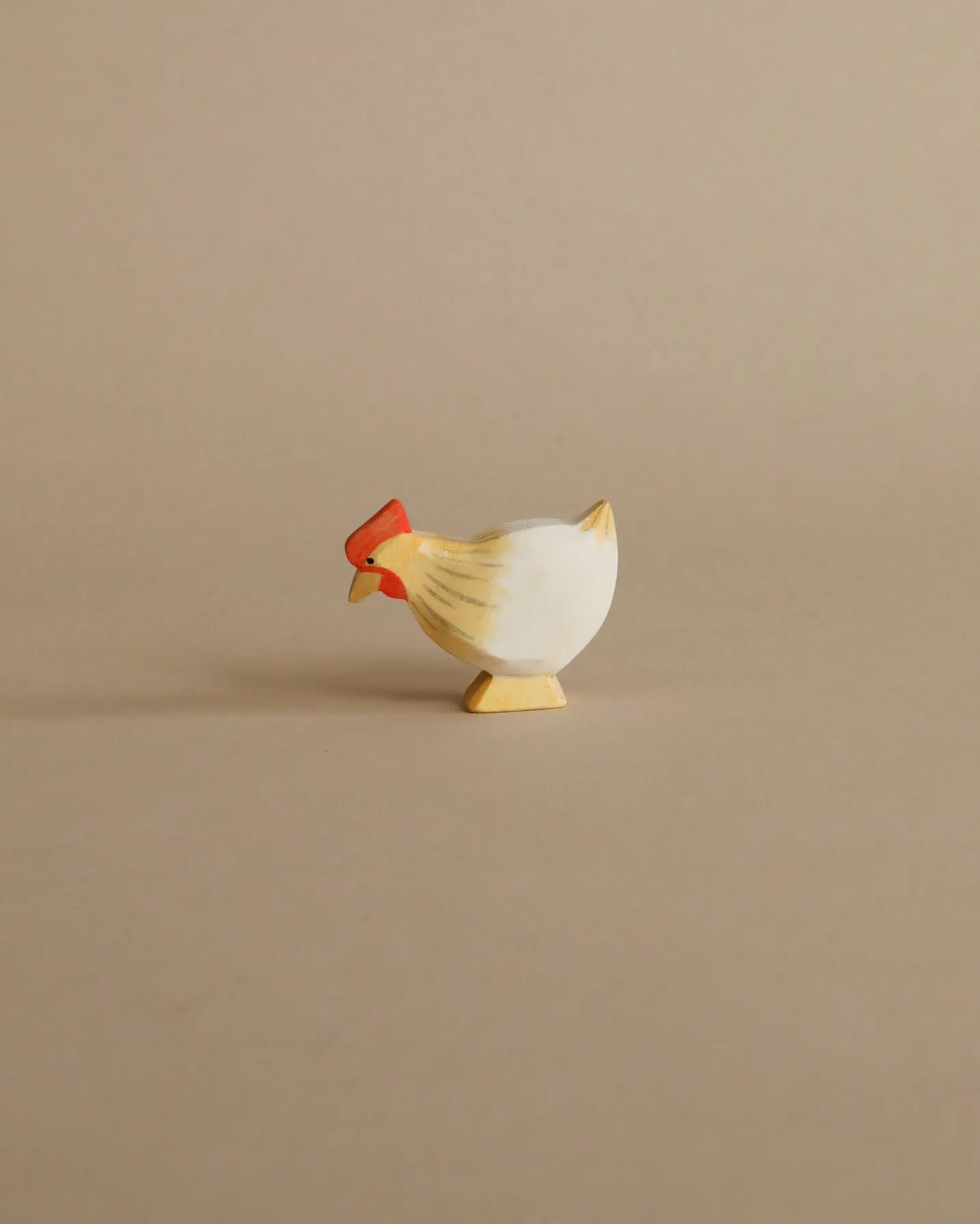 Ostheimer Hen Standing - Ochre Odin Parker